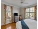 Inviting bedroom with hardwood floors and large windows, offering a bright space at 4006 Hartnett Blvd, Isle of Palms, SC 29451