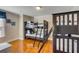Bunkroom featuring wooden floors and dark-stained triple bunkbeds at 4006 Hartnett Blvd, Isle of Palms, SC 29451