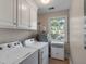 Laundry room with front load washer and dryer at 4006 Hartnett Blvd, Isle of Palms, SC 29451