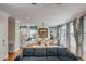 Open-concept living space includes a comfortable sofa and inviting dining area at 4006 Hartnett Blvd, Isle of Palms, SC 29451