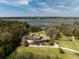 Captivating aerial showcasing waterfront estate with a pool, trees, and beautiful landscape at 4020 Betsy Kerrison Pkwy, Johns Island, SC 29455