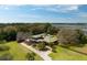 Breathtaking aerial view of waterfront estate with pool and lush landscape at 4020 Betsy Kerrison Pkwy, Johns Island, SC 29455