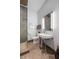 Well-lit bathroom with modern fixtures, glass-enclosed shower, and a clean design at 4020 Betsy Kerrison Pkwy, Johns Island, SC 29455