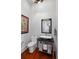 Elegant bathroom features a sleek vessel sink, modern mirror, and a toilet with a luxurious feel at 4020 Betsy Kerrison Pkwy, Johns Island, SC 29455