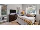Cozy bedroom featuring natural light, neutral decor, and serene views at 4020 Betsy Kerrison Pkwy, Johns Island, SC 29455