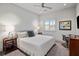 Clean, bright bedroom features a plush bed, a cozy desk and natural light from the window at 4020 Betsy Kerrison Pkwy, Johns Island, SC 29455