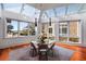 Cozy dining area with skylight and large windows overlooking green landscape at 4020 Betsy Kerrison Pkwy, Johns Island, SC 29455