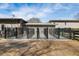 Exterior shot of home's outdoor pet kennels with metal fencing at 4020 Betsy Kerrison Pkwy, Johns Island, SC 29455