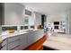 Gourmet kitchen featuring marble countertops and views of the living room at 4020 Betsy Kerrison Pkwy, Johns Island, SC 29455