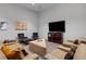 Spacious theater room with comfortable seating, large screen, and modern decor at 4020 Betsy Kerrison Pkwy, Johns Island, SC 29455