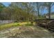 Backyard featuring a patio with steps down to the lawn and a wood perimeter fence at 406 Mendenhall St, Summerville, SC 29483