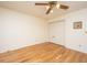 Bedroom featuring hardwood flooring, closet, and a ceiling fan at 406 Mendenhall St, Summerville, SC 29483