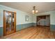 Cozy dining room with hardwood floors, natural light and decorative chair rail at 406 Mendenhall St, Summerville, SC 29483