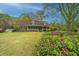 Beautiful home featuring a lush front yard and a cozy, covered front porch at 406 Mendenhall St, Summerville, SC 29483