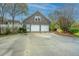 Two car garage with brick exterior at 406 Mendenhall St, Summerville, SC 29483
