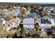 Aerial view of a home near a lake showcasing the backyard, and neighborhood at 4108 Whiting St, Mount Pleasant, SC 29466