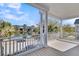 Scenic view from a balcony overlooking a tranquil pond and lush greenery on a sunny day at 4108 Whiting St, Mount Pleasant, SC 29466
