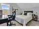 Bright bedroom with a work desk and a comfortable bed at 4108 Whiting St, Mount Pleasant, SC 29466