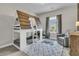 Charming bedroom with unique bunk bed, soft rug, and comfortable reading chair at 4108 Whiting St, Mount Pleasant, SC 29466