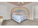 Charming bedroom with rainbow wall mural and neutral color carpet at 4108 Whiting St, Mount Pleasant, SC 29466