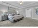 Beautiful bedroom featuring plush carpet, decorative ceiling, and soft natural light at 4108 Whiting St, Mount Pleasant, SC 29466