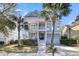 Attractive two-story home with a double front porch, a lush front yard, and a convenient two-car garage at 4108 Whiting St, Mount Pleasant, SC 29466