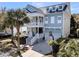 Charming two-story home with a welcoming front porch, well-manicured landscaping, and a spacious driveway at 4108 Whiting St, Mount Pleasant, SC 29466