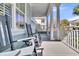 Relaxing front porch view with rocking chairs, offering a charming outdoor seating area at 4108 Whiting St, Mount Pleasant, SC 29466