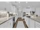 Modern kitchen featuring ample counter space, stainless steel appliances, and hardwood flooring at 4108 Whiting St, Mount Pleasant, SC 29466