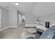 Upstairs living room with neutral color scheme, perfect for relaxation and entertainment at 4108 Whiting St, Mount Pleasant, SC 29466