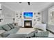 Inviting living room with fireplace, built-in shelves, and plush seating, perfect for relaxation at 4108 Whiting St, Mount Pleasant, SC 29466