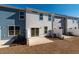 Backyard exterior of new construction townhomes with patio at 418 Duskywing Dr, Goose Creek, SC 29445