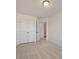 Bright bedroom with closet and view to the ensuite bathroom at 418 Duskywing Dr, Goose Creek, SC 29445