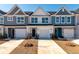 Charming new townhomes featuring varied facades and attached garages, modern and move-in ready at 418 Duskywing Dr, Goose Creek, SC 29445