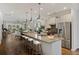 Spacious kitchen with a large island, pendant lighting, stainless steel appliances, and ample counter space at 422 Switchgrass Dr, Summerville, SC 29486