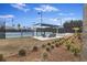 Outdoor tennis courts with shade structure and seating for relaxing between matches at 422 Switchgrass Dr, Summerville, SC 29486