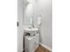 Stylish powder room featuring a modern vanity and a sleek, wall-mounted sink at 455 Minim St, Charleston, SC 29414
