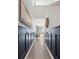 Stylish hallway featuring wood-look floors, decorative wainscoting, and elegant decor at 455 Minim St, Charleston, SC 29414
