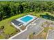 Aerial view of a community pool with surrounding trees and parking lot at 455 Minim St, Charleston, SC 29414