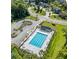 Aerial view of a sparkling community pool, lounge chairs and parking spaces at 455 Minim St, Charleston, SC 29414