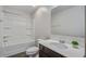 Bathroom features a shower-tub combo and a vanity with a clean, modern sink at 491 Fox Sparrow Ct, Summerville, SC 29486