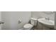 Bathroom featuring toilet, sink and door with silver hardware at 491 Fox Sparrow Ct, Summerville, SC 29486