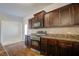 Well-lit kitchen with stainless steel oven and microwave, and ample cabinet space at 491 Fox Sparrow Ct, Summerville, SC 29486