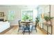 Cozy dining area bathed in natural light, complemented by stylish décor and views to the outdoors at 509 Yukon Ct, Lincolnville, SC 29485