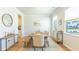 Bright dining room with a wooden table and stylish decor at 509 Yukon Ct, Lincolnville, SC 29485