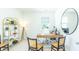 Bright home office with modern furniture, ample desk space, and natural light for a productive work environment at 509 Yukon Ct, Lincolnville, SC 29485
