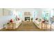 Inviting living room with fireplace, neutral décor, and ample seating at 509 Yukon Ct, Lincolnville, SC 29485