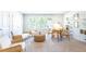 Bright living room with ample seating, natural light, and cozy area for entertaining at 509 Yukon Ct, Lincolnville, SC 29485