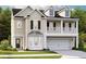 Charming two-story home with a welcoming front porch and a well-manicured lawn at 531 Verdi Dr, Summerville, SC 29486
