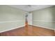 Spacious bedroom with hardwood floors, a ceiling fan, and freshly painted walls at 649 Pawley Rd, Mount Pleasant, SC 29464